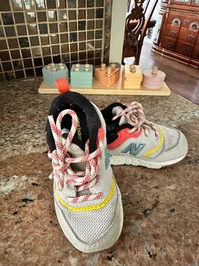 New Balance Kids Gray Sneakers with Coral, Yellow & Blue Details